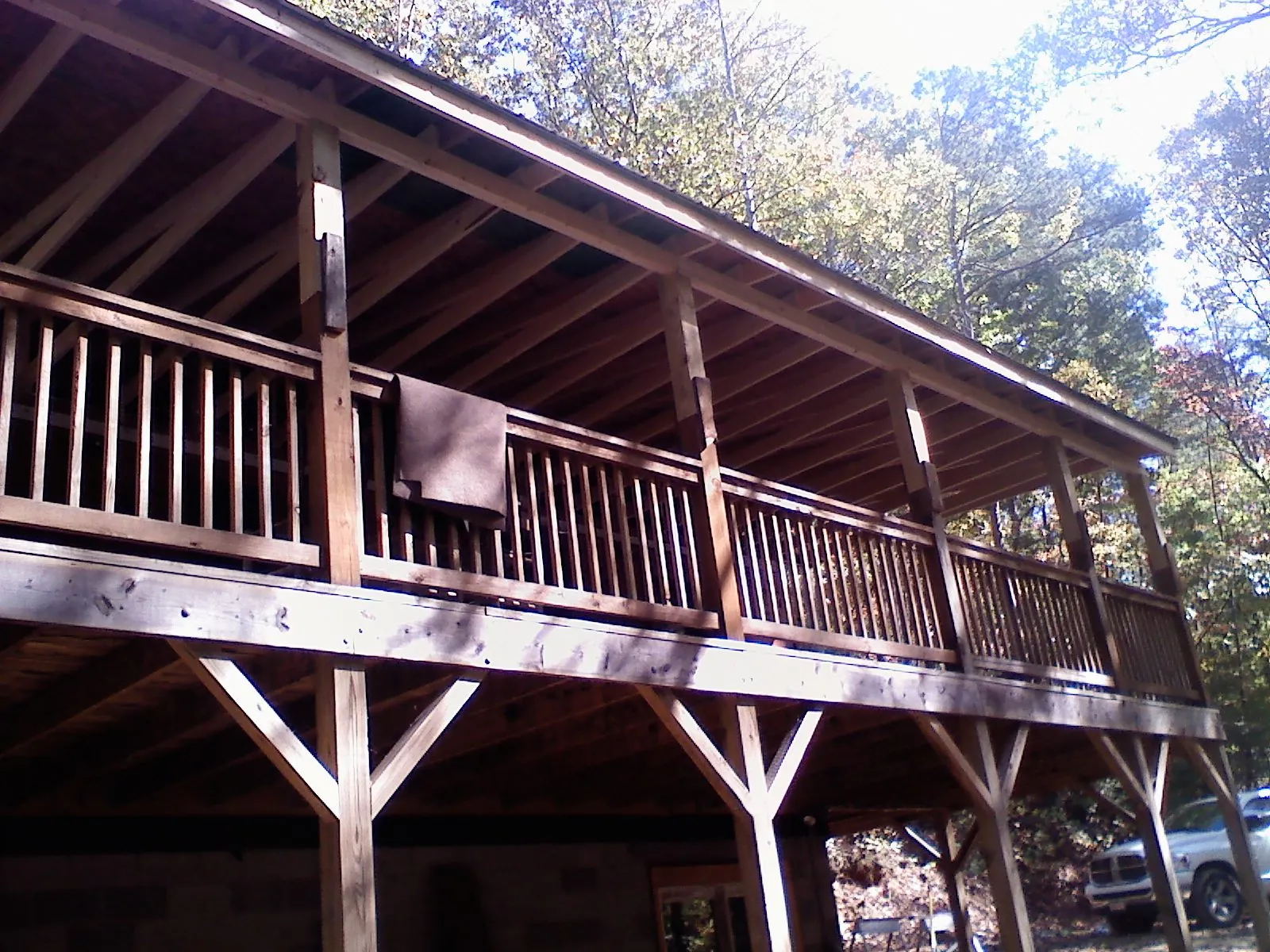 Timber framing under a new elevated porch and deck — Roof Leak Repair in Columbia Station by Roofing Brothers